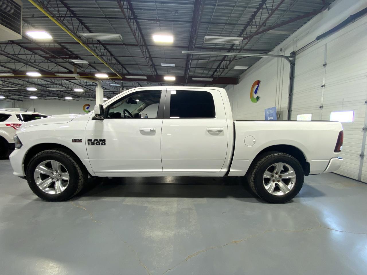 2016 RAM 1500 4WD Crew Cab 140.5" Sport - Photo #2