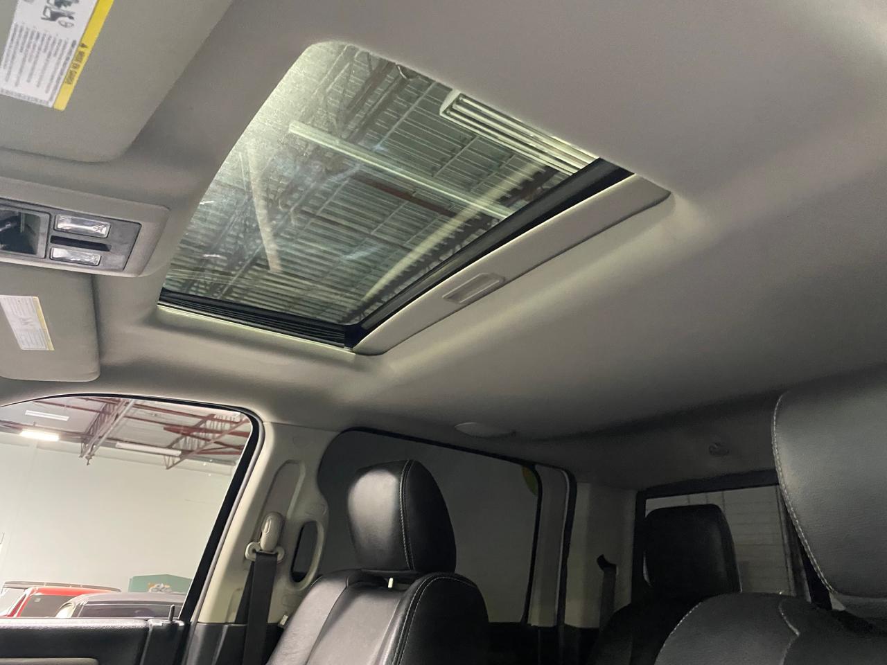 2016 RAM 1500 4WD Crew Cab 140.5" Sport - Photo #16