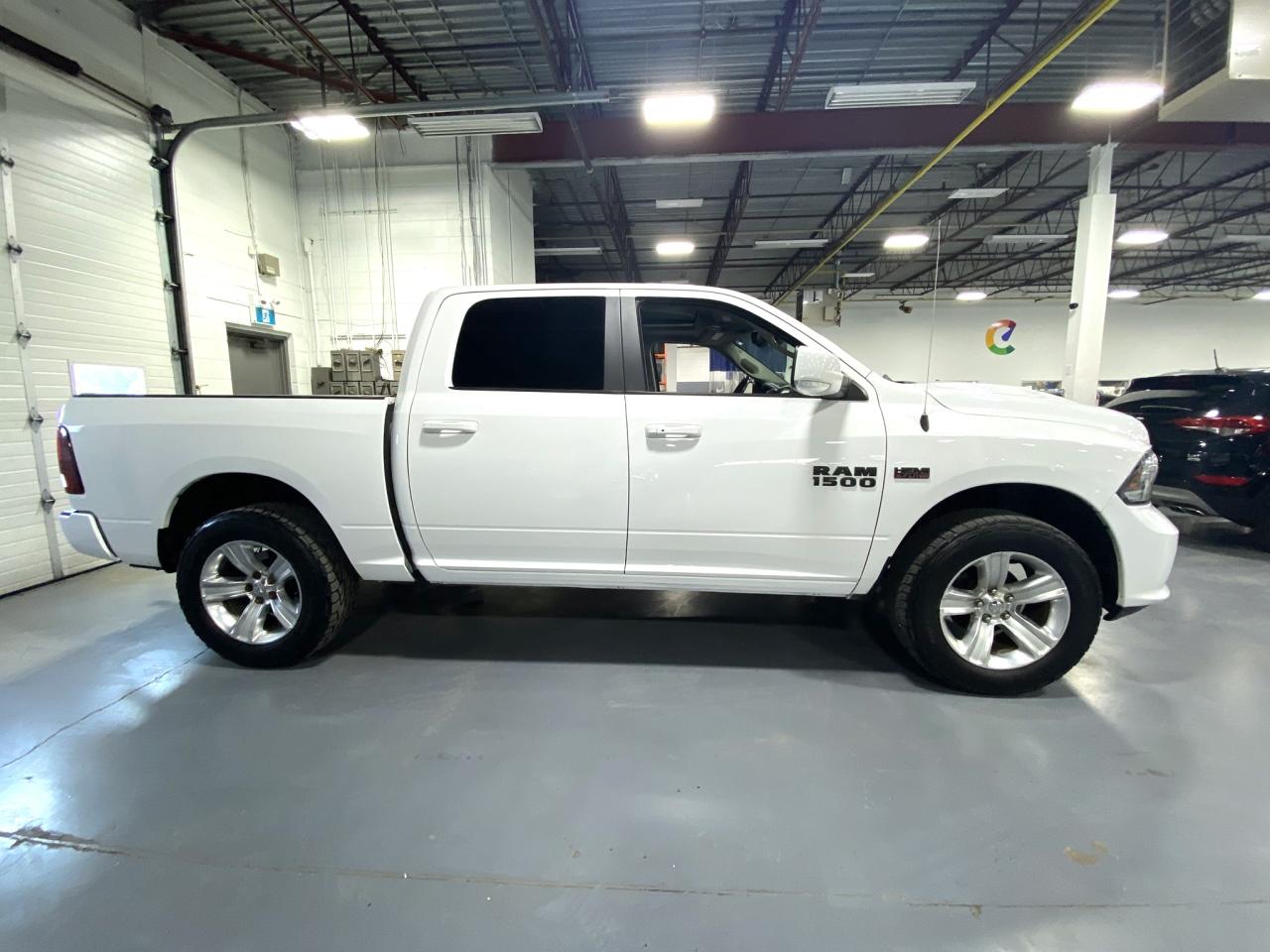 2016 RAM 1500 4WD Crew Cab 140.5" Sport - Photo #6