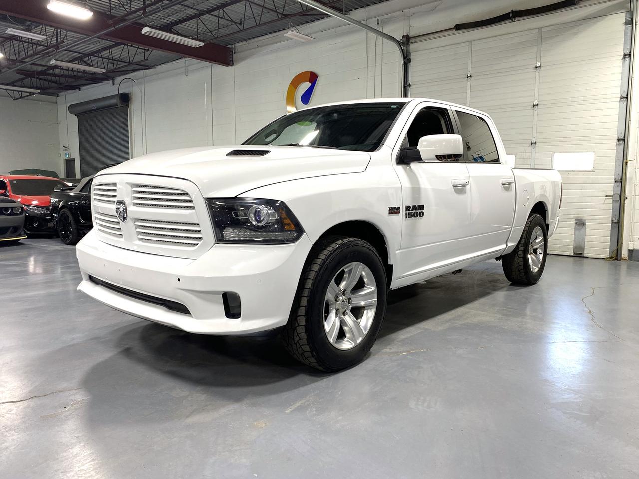 2016 RAM 1500 4WD Crew Cab 140.5" Sport - Photo #1