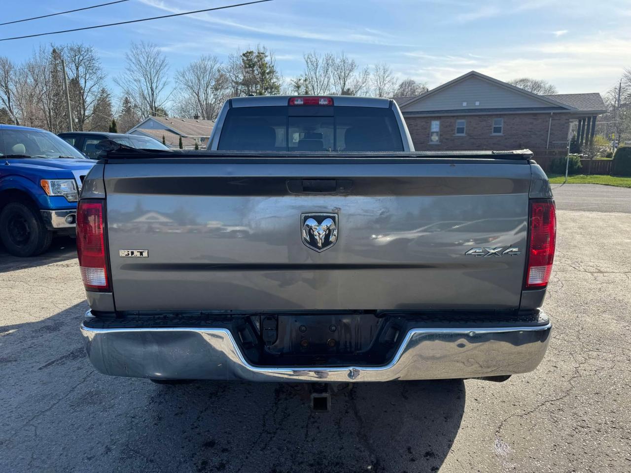 2013 RAM 1500 4WD Quad Cab 140.5" SLT - Photo #6