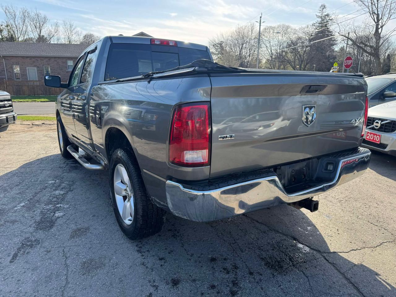 2013 RAM 1500 4WD Quad Cab 140.5" SLT - Photo #5