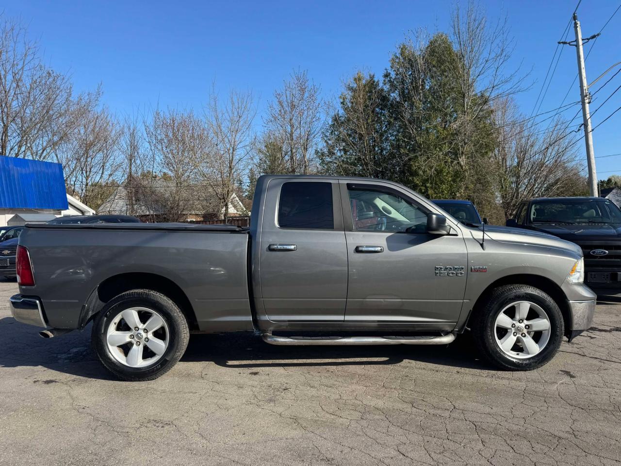 2013 RAM 1500 4WD Quad Cab 140.5" SLT - Photo #8