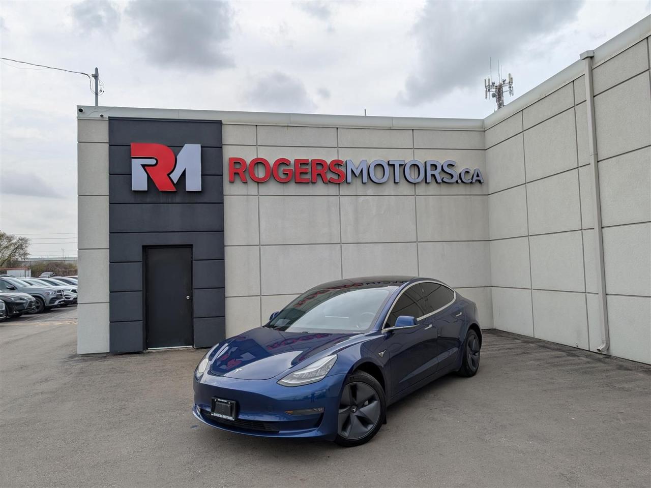 Photo of Blue 2019 Tesla Model 3