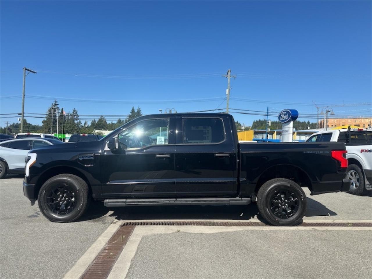 2025 Ford F-150 Lightning XLT  - Tailgate Step Photo