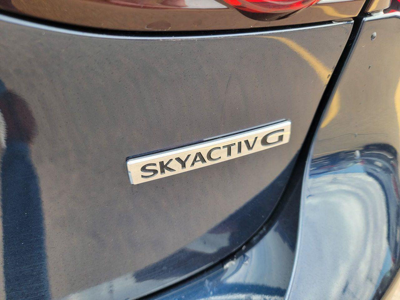 12472837