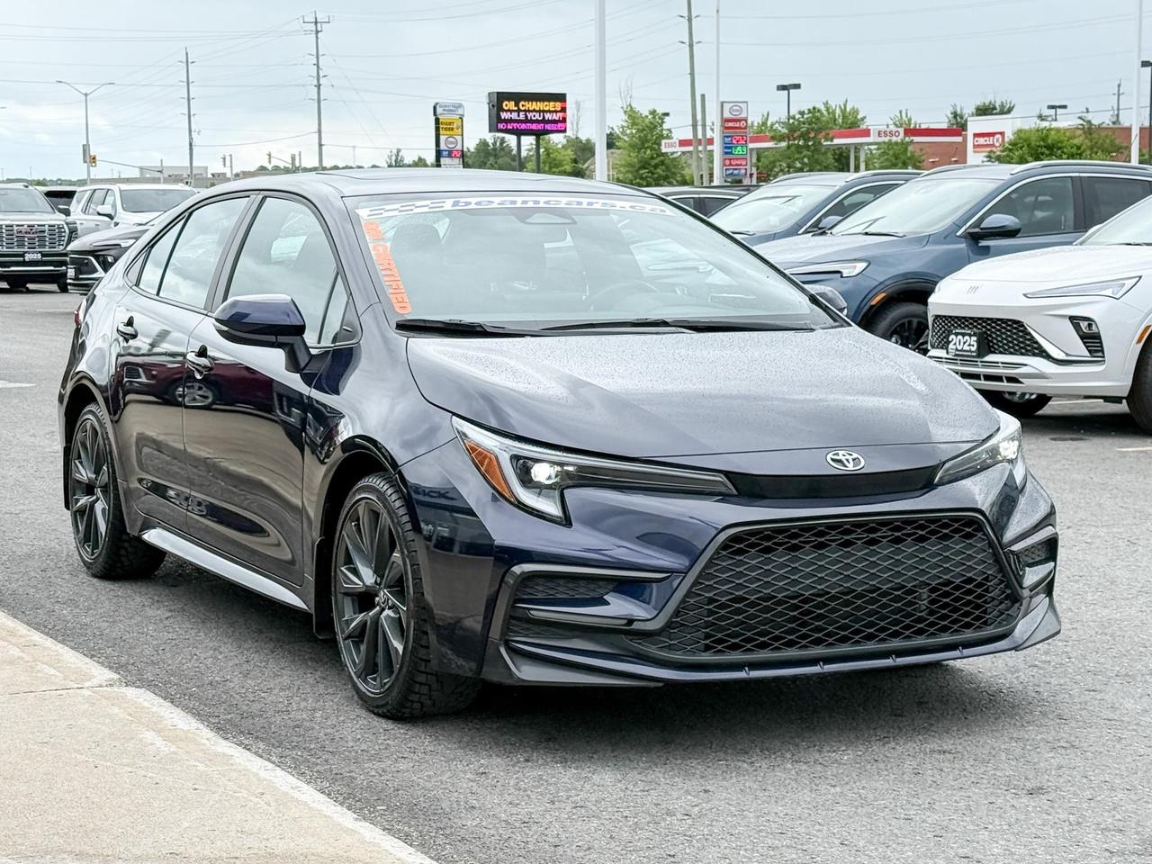 2023 Toyota Corolla 2.0L 4CYL, SE UPGRADE PACKAGE - 18" BLACK ALLOY RIMS, SUNROOF, HEATED LEATHER WRAPPED STEERING WHEEL Photo