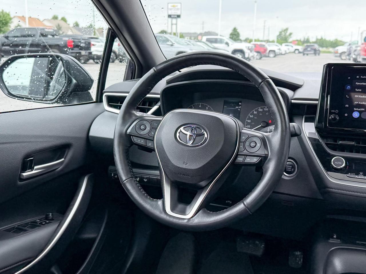 2023 Toyota Corolla 2.0L 4CYL, SE UPGRADE PACKAGE - 18" BLACK ALLOY RIMS, SUNROOF, HEATED LEATHER WRAPPED STEERING WHEEL Photo