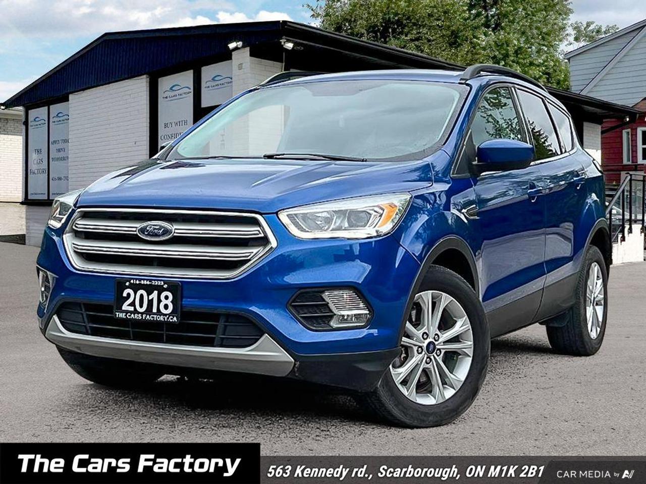 <p data-start=0 data-end=104>2018 Ford Escape SEL 4WD &ndash; One Owner | Clean Title | Atlas Blue Metallic on Black Leather | Fully Loaded</p><p data-start=106 data-end=515>If you&rsquo;ve been searching for a clean, reliable SUV that combines comfort, technology, safety, and all-weather capability, this 2018 Ford Escape SEL 4WD is exactly the vehicle you&rsquo;ve been waiting for. One-owner, clean title, exceptionally well cared for, and finished in stunning Atlas Blue Metallic over a sleek Black Leather interior, this Escape delivers the perfect blend of style, practicality, and value.</p><p data-start=517 data-end=950>The beautiful Atlas Blue Metallic exterior gives this Escape a premium look that stands out day or night, while the black leather interior creates a clean, upscale cabin feel that remains timeless and luxurious. This SUV has been meticulously maintained and regularly serviced, with no warning lights, no mechanical issues, and a smooth, confident drive that speaks for itself. It has clearly been cared for with pride and attention.</p><p data-start=952 data-end=1311>Under the hood sits Ford&rsquo;s fuel-efficient and responsive 1.5L EcoBoost engine paired with a smooth 6-speed automatic transmission and intelligent 4WD system, giving you excellent fuel economy without sacrificing performance. Whether youre commuting daily, navigating harsh Canadian winters, or taking family road trips, this Escape is ready for every season.</p><p data-start=1313 data-end=1754>Step inside and enjoy premium features throughout, including black leather heated front seats, a power-adjustable driver&rsquo;s seat, dual-zone climate control, push-button start, and a spacious cabin designed with comfort in mind. The touchscreen infotainment system comes loaded with built-in navigation, Apple CarPlay, Android Auto, Bluetooth connectivity, voice command, and premium audio so you stay connected and entertained on every drive.</p><p data-start=1756 data-end=2004>Convenience and safety are equally impressive with a backup camera, rear parking sensors, keyless entry, cruise control, fog lights, roof rails, alloy wheels, advanced safety systems, and fold-flat rear seats that offer excellent cargo flexibility.</p><p data-start=2006 data-end=2165>This Escape is exceptionally clean inside and out &mdash; smoke-free, pet-free, fully inspected, and needs absolutely nothing. Everything works exactly as it should.</p><p data-start=2167 data-end=2371>Finding a one-owner, clean-title, fully loaded SUV in Atlas Blue Metallic with black leather interior and this level of care is becoming harder to find. Vehicles in this condition simply do not last long.</p><p data-start=2373 data-end=2453 data-is-last-node= data-is-only-node=>Contact us today to schedule your test drive before someone else drives it home.</p><p>Available for $14,990 cash, or financed from $12,990 (6.99% O.A.C., finance fee applies).</p><p data-start=1330 data-end=1360>&nbsp;</p><p data-start=1330 data-end=1360>Welcome to The Cars Factory!</p><p data-start=1362 data-end=1444>Your Premier Destination for Quality Pre-Owned Vehicles in Scarborough, Ontario!</p><p data-start=1446 data-end=1579>Located at 563 Kennedy Rd., Scarborough, Ontario, Canada<br data-start=1502 data-end=1505>Appointments Available &ndash; Personalized, hassle-free service just for you!</p><p data-start=1581 data-end=2010>CERTIFIED VEHICLES YOU CAN TRUST!<br data-start=1614 data-end=1617>Drive with confidence knowing your vehicle has passed our comprehensive safety inspection &ndash; going above and beyond industry standards! We also include a fresh oil change and professional detailing before your car hits the road.<br data-start=1844 data-end=1847>Certification Package available for only $899.<br data-start=1893 data-end=1896>Note: Vehicles are not drivable unless certified and e-tested. All trade-ins welcome! Taxes and licensing extra.</p><p data-start=2012 data-end=2293>EASY FINANCING &ndash; APPROVALS MADE SIMPLE!<br data-start=2051 data-end=2054>No credit? New to Canada? Struggling with past credit history? We specialize in getting you approved! Our expert finance team will work with you no matter your situation &ndash; whether it&rsquo;s a history of bankruptcy, collections, or bad credit.</p><ul data-start=2295 data-end=2448><li data-start=2295 data-end=2345><p data-start=2297 data-end=2345>On-the-spot financing &ndash; Get approved instantly</p></li><li data-start=2346 data-end=2392><p data-start=2348 data-end=2392>Bad credit? You&rsquo;re still likely to qualify</p></li><li data-start=2393 data-end=2448><p data-start=2395 data-end=2448>Take control and start rebuilding your credit today</p></li></ul><p data-start=2450 data-end=2511>Please note: Financing is subject to an administrative fee.</p><p data-start=2513 data-end=2803>PEACE OF MIND WITH EXTENDED WARRANTIES!<br data-start=2552 data-end=2555>Don&rsquo;t leave your vehicle&rsquo;s future to chance! Protect your investment with an eligible extended warranty. We offer customizable coverage options that give you the peace of mind you deserve. Speak with our team to find the best plan for your needs!</p><p data-start=2805 data-end=3070>NO-HAGGLE PRICING &ndash; THE BEST DEAL, GUARANTEED!<br data-start=2851 data-end=2854>The Cars Factory ensures you get the best price from day one! With no-haggle pricing and constant market monitoring, we guarantee you&rsquo;re always getting an unbeatable deal. No surprises, no stress &ndash; just pure value!</p><p data-start=3072 data-end=3102>Why Choose The Cars Factory?</p><p data-start=3104 data-end=3352>At The Cars Factory, we put quality, transparency, and customer satisfaction at the forefront of everything we do. Our goal is to deliver the best experience for every customer, with a focus on making your car-buying journey smooth and enjoyable.</p><p data-start=3354 data-end=3500>Book your appointment today and discover why The Cars Factory is the smart choice for your next vehicle! Don&rsquo;t miss out on our unbeatable deals!</p><hr data-start=3502 data-end=3507><p style=border: 0px solid #e5e7eb; box-sizing: border-box; --tw-border-spacing-x: 0; --tw-border-spacing-y: 0; --tw-translate-x: 0; --tw-translate-y: 0; --tw-rotate: 0; --tw-skew-x: 0; --tw-skew-y: 0; --tw-scale-x: 1; --tw-scale-y: 1; --tw-scroll-snap-strictness: proximity; --tw-ring-offset-width: 0px; --tw-ring-offset-color: #fff; --tw-ring-color: rgba(59,130,246,.5); --tw-ring-offset-shadow: 0 0 #0000; --tw-ring-shadow: 0 0 #0000; --tw-shadow: 0 0 #0000; --tw-shadow-colored: 0 0 #0000; margin: 0px; font-family: Inter, sans-serif;>&nbsp;</p><p data-start=3509 data-end=3596><strong data-start=3509 data-end=3524>Disclaimer:</strong> All vehicles are subject to HST, licensing fees, and a $22 OMVIC fee.</p>