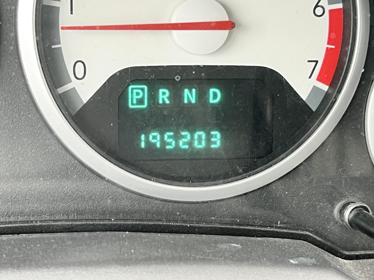 12490027