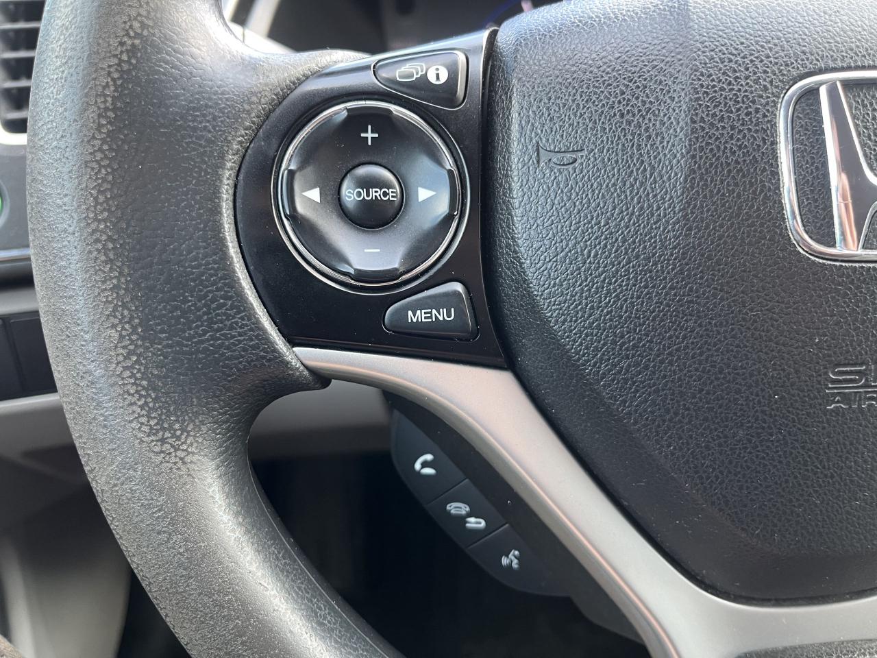 12490702