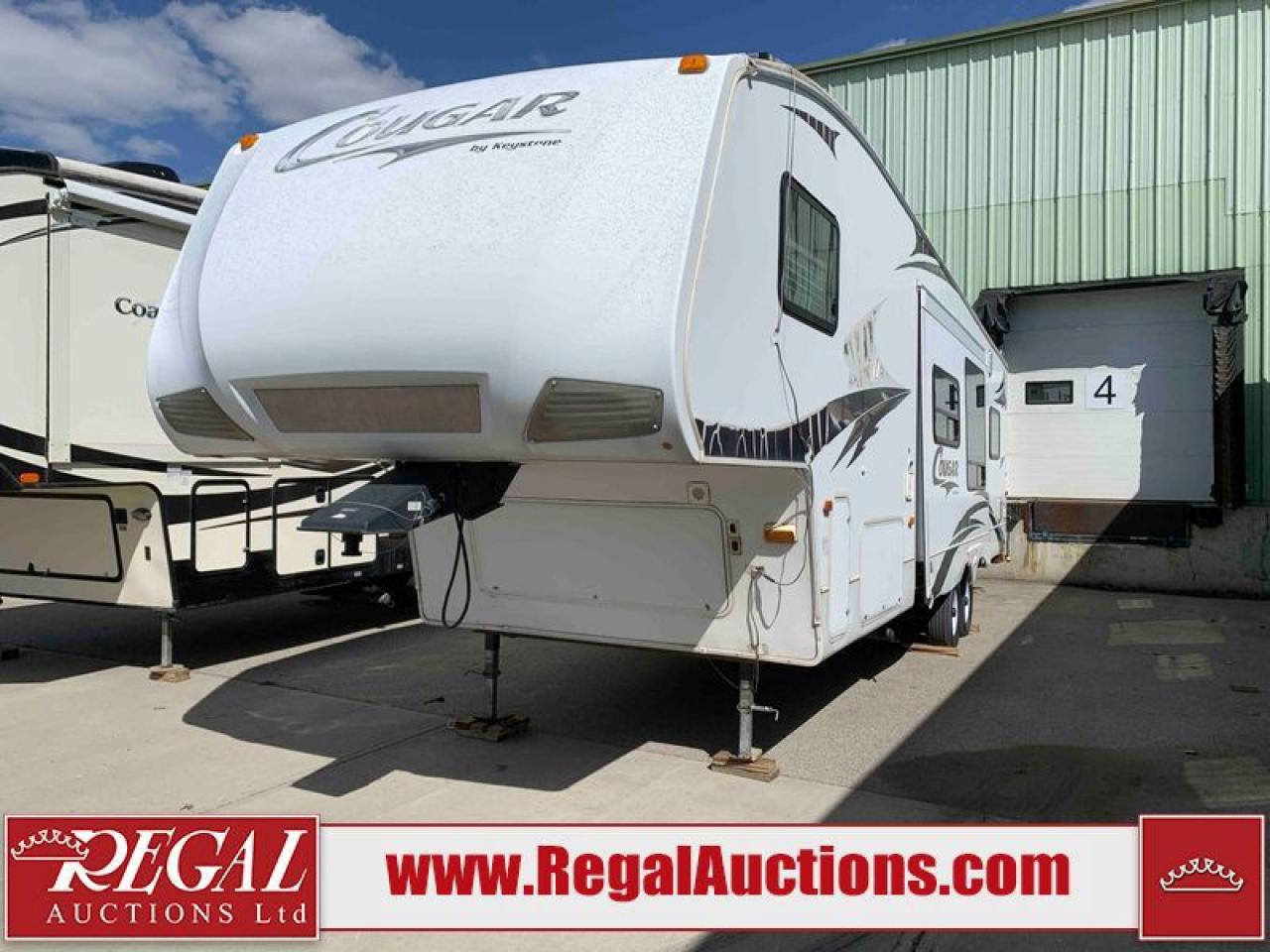 Used 2009 Keystone COUGAR 310SRX for sale in Calgary, AB