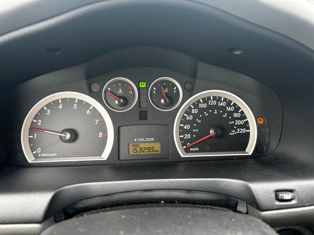 12497640
