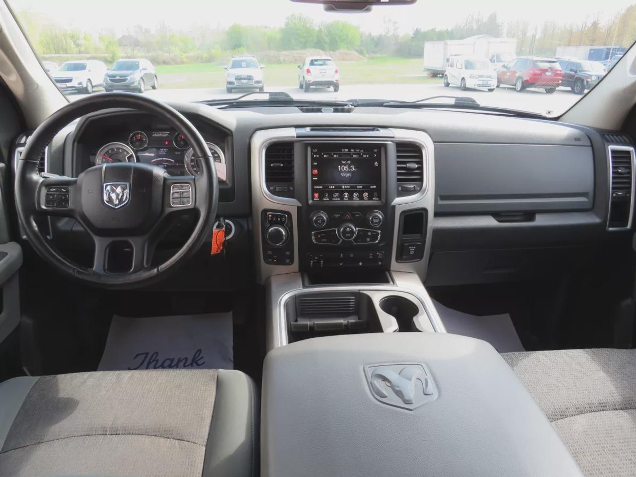 2017 RAM 1500 Big Horn | One Owner | Clean Title | No Accidents | Safety Certified | Diesel | 4wd | Running Boards | Trailer Hitch | Tow Hooks | Remote Start | Navigation | Reverse Camera | Power Seats | Digital Touchscreen | Heated Seats | Heated Steering Wheel Photo