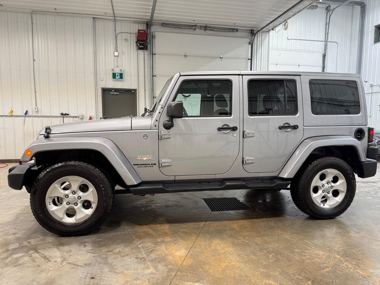 Used 2014 Jeep Wrangler Unlimited Sahara for sale in Winnipeg, MB
