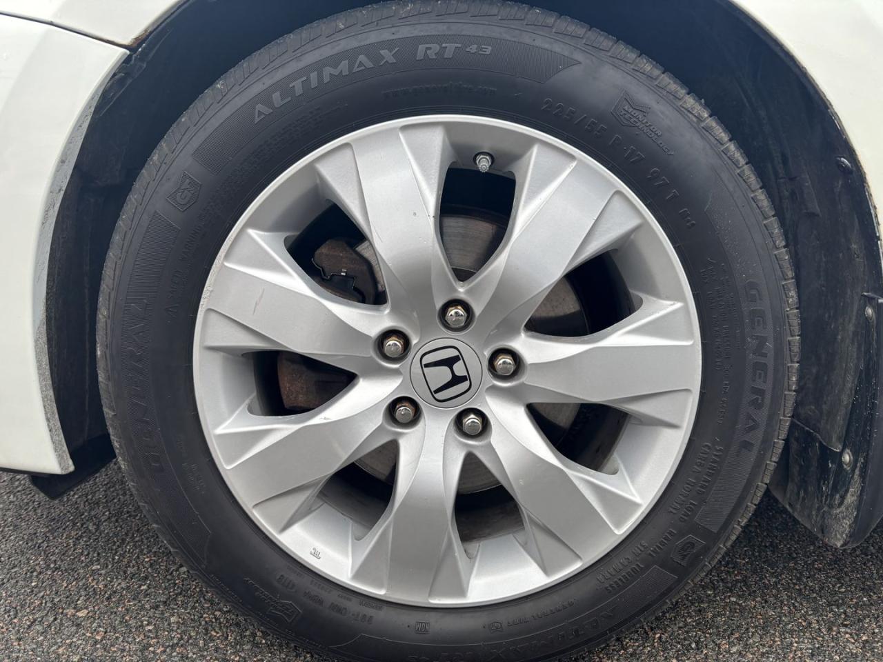 12513412