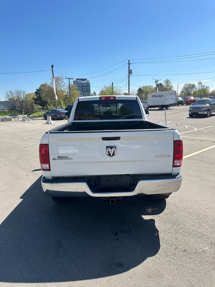 2016 RAM 1500 4WD Quad Cab 140.5" Outdoorsman - Photo #4