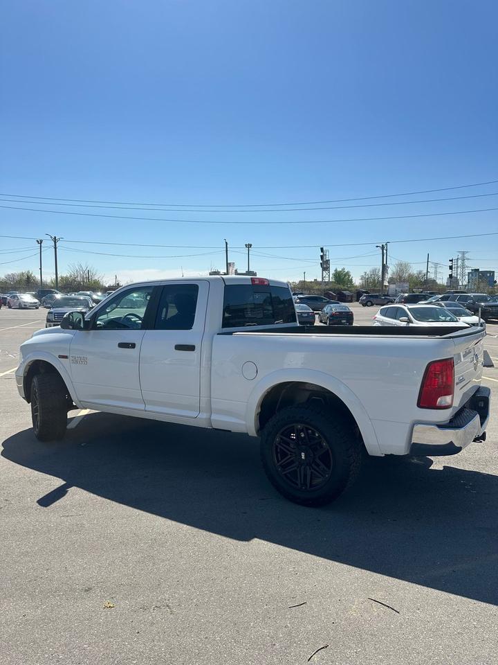 2016 RAM 1500 4WD Quad Cab 140.5" Outdoorsman - Photo #3