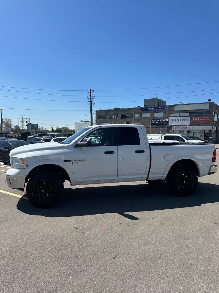 2016 RAM 1500 4WD Quad Cab 140.5" Outdoorsman - Photo #2