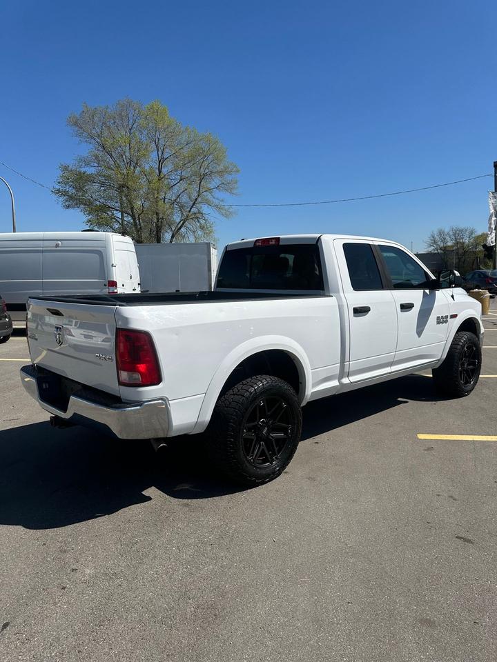 2016 RAM 1500 4WD Quad Cab 140.5" Outdoorsman - Photo #5