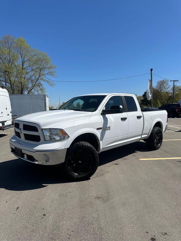 2016 RAM 1500 4WD Quad Cab 140.5" Outdoorsman
