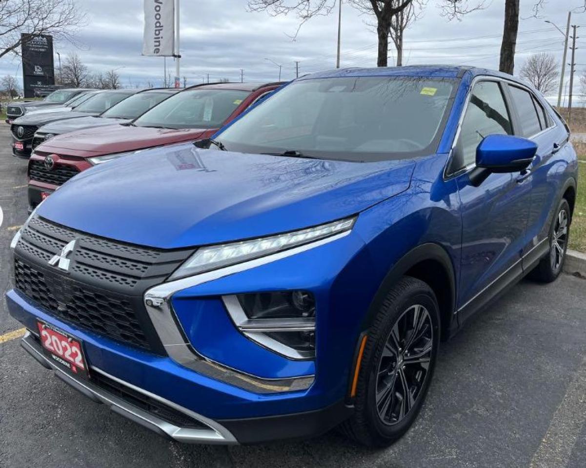 Turn heads with this stunning blue Mitsubishi Eclipse Cross SE S-AWC SUV, built to handle any terrain with its hardy 4x4 drivetrain. Its sporty stance and elegant bodywork perfectly complement the allure of its alloy wheels. Slide into the sophisticated interior, where youll find modern amenities like heated seats and smart device integration. Subtle yet impactful, every drive is enhanced by premium materials and intuitive design, making any trip a comfort-forward experience. Navigating your journeys with confidence is easy with this vehicles cutting-edge technology. Stay connected through the Bluetooth connection and enjoy your favorite tunes with satellite radio. For added peace of mind, the backup camera and brake assist provide enhanced safety, making every drive both thrilling and secure. This SUV is perfect for families in need of reliability and tech-savvy drivers seeking the perfect blend of adventure and practicality. Contact our dealership today to schedule a test drive and experience the Mitsubishi Eclipse Cross for yourself.