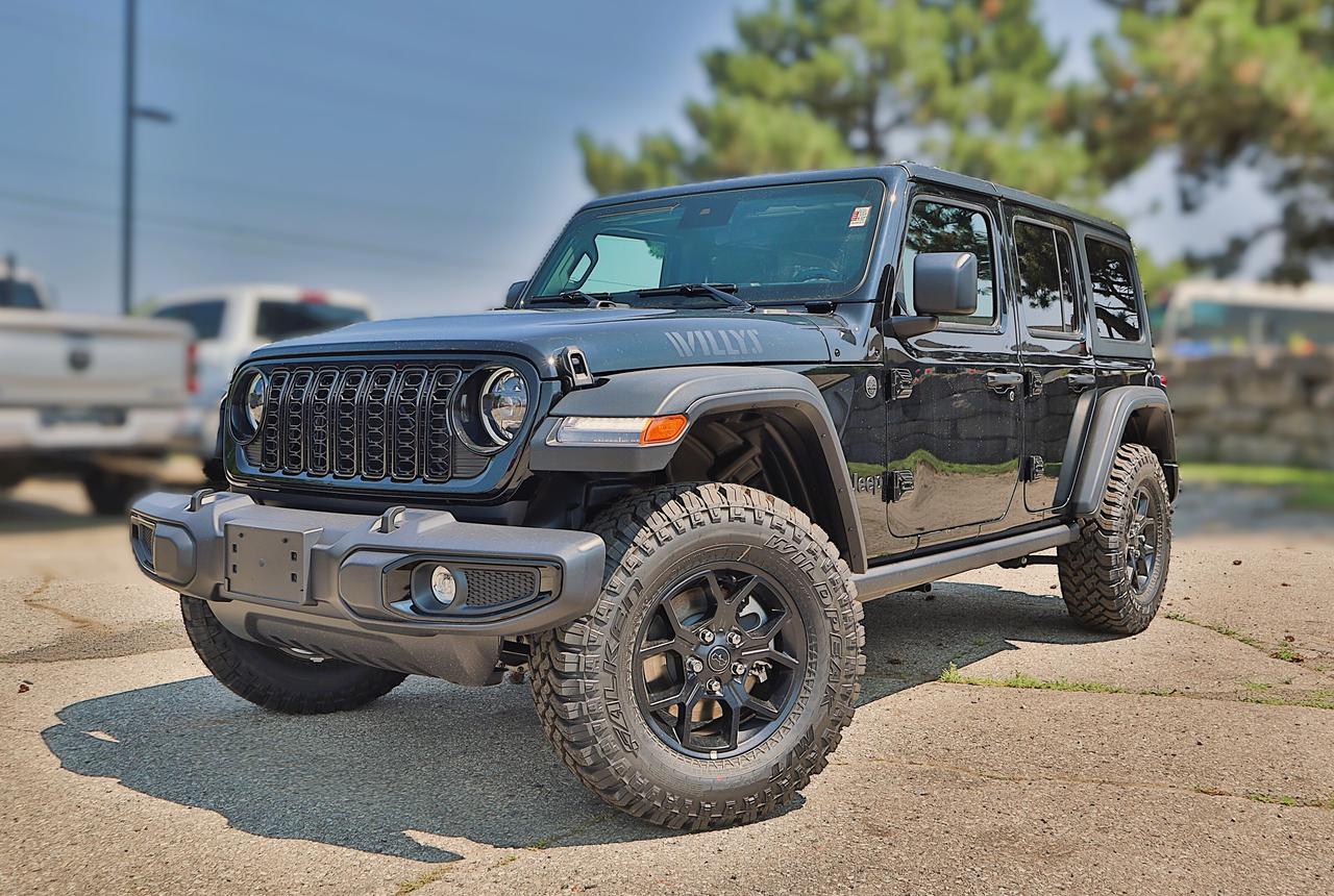 Conquer the road in our New 2025 Jeep Wrangler Willys 4 Door 4X4 with the Convenience Pack displayed in Black! Driven by a 3.6 Litre Pentastar V6 supplying 285hp to an 8 Speed Automatic transmission with an Off-Road Plus mode for enhanced trail performance. Dana axles and an electronic locking rear differential help you conquer almost any conditions, and this Four Wheel Drive SUV returns approximately 10.2L/100km on the highway. Eye-catching Willys hood graphics help our Wrangler grab attention with LED lighting, fog lamps, alloy wheels, fender flares, a sport bar, and a fantastic open-air driving experience when you drop the top, fold down the Gorilla Glass windshield, and remove the doors!

Thanks to our Convenience Pack, you can feel good with the top up or down in our Willys cabin. It bundles heated cloth seats, a heated-wrapped steering wheel, automatic climate control, remote start, and a 7-inch driver display for better driving. Uconnect technology powers your infotainment system to enjoy a 12.3-inch touchscreen, 3.5-inch driver display, Apple CarPlay&reg;, WiFi compatibility, Android Auto&reg;, Bluetooth&reg;, and an eight-speaker audio system.

Stay safe as you dominate your days, knowing Jeep has your back with automatic braking, adaptive cruise control, a rearview camera, forward collision warning, trailer sway damping, hill start assistance, and more. The world awaits, and our Wrangler Willys is ready to go! Save this Page and Call for Availability. We Know You Will Enjoy Your Test Drive Towards Ownership!