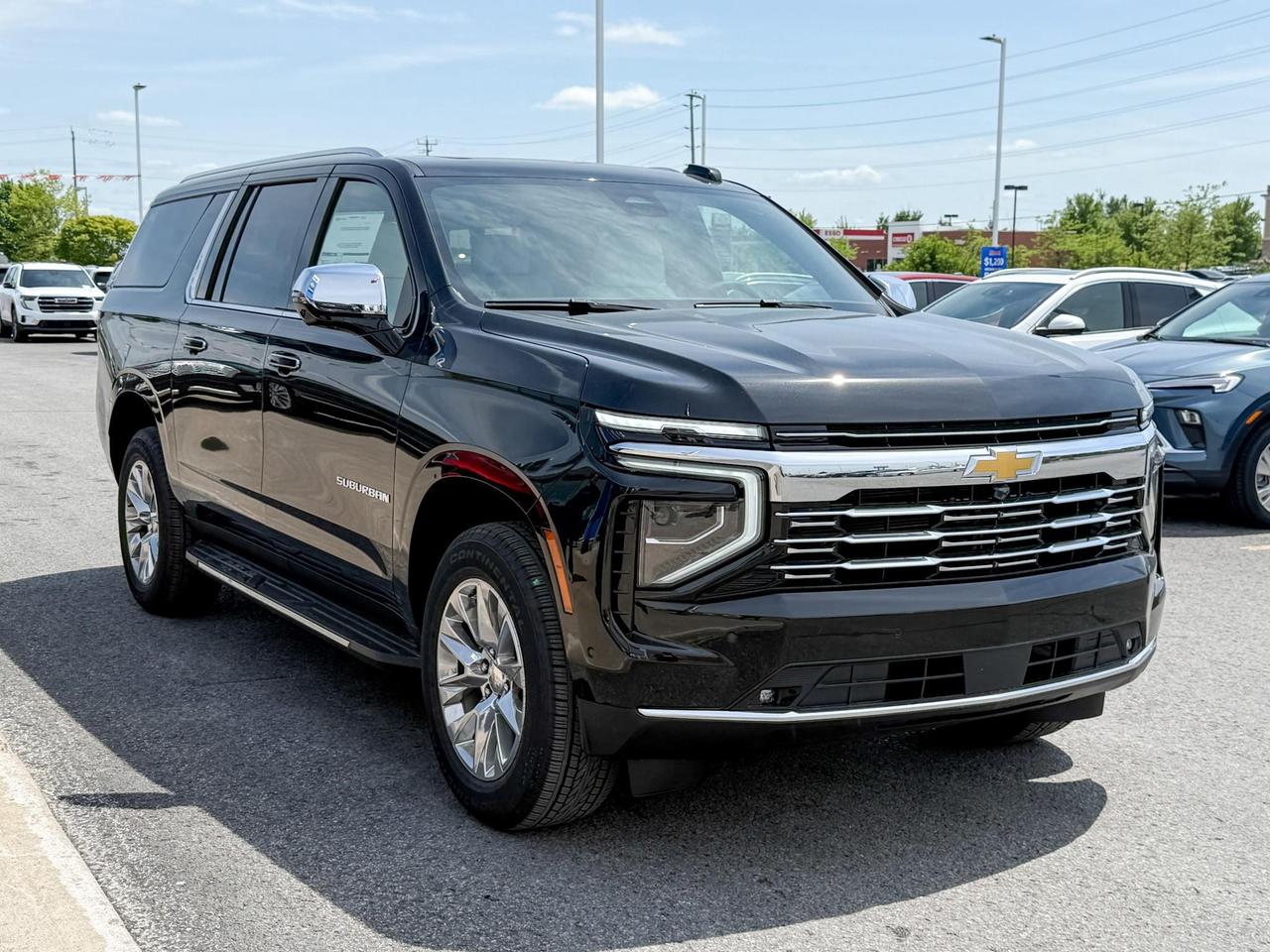 2025 Chevrolet Suburban Premier 3.0L DURAMAX WITH REMOTE START/ENTRY, SUNROOF, HEATED SEATS, HEATED STEERING WHEEL, VENTILATED SEATS, POWER LIFTGATE, BOSE SPEAKER SYSTEM, HD SURROUND VISION Photo