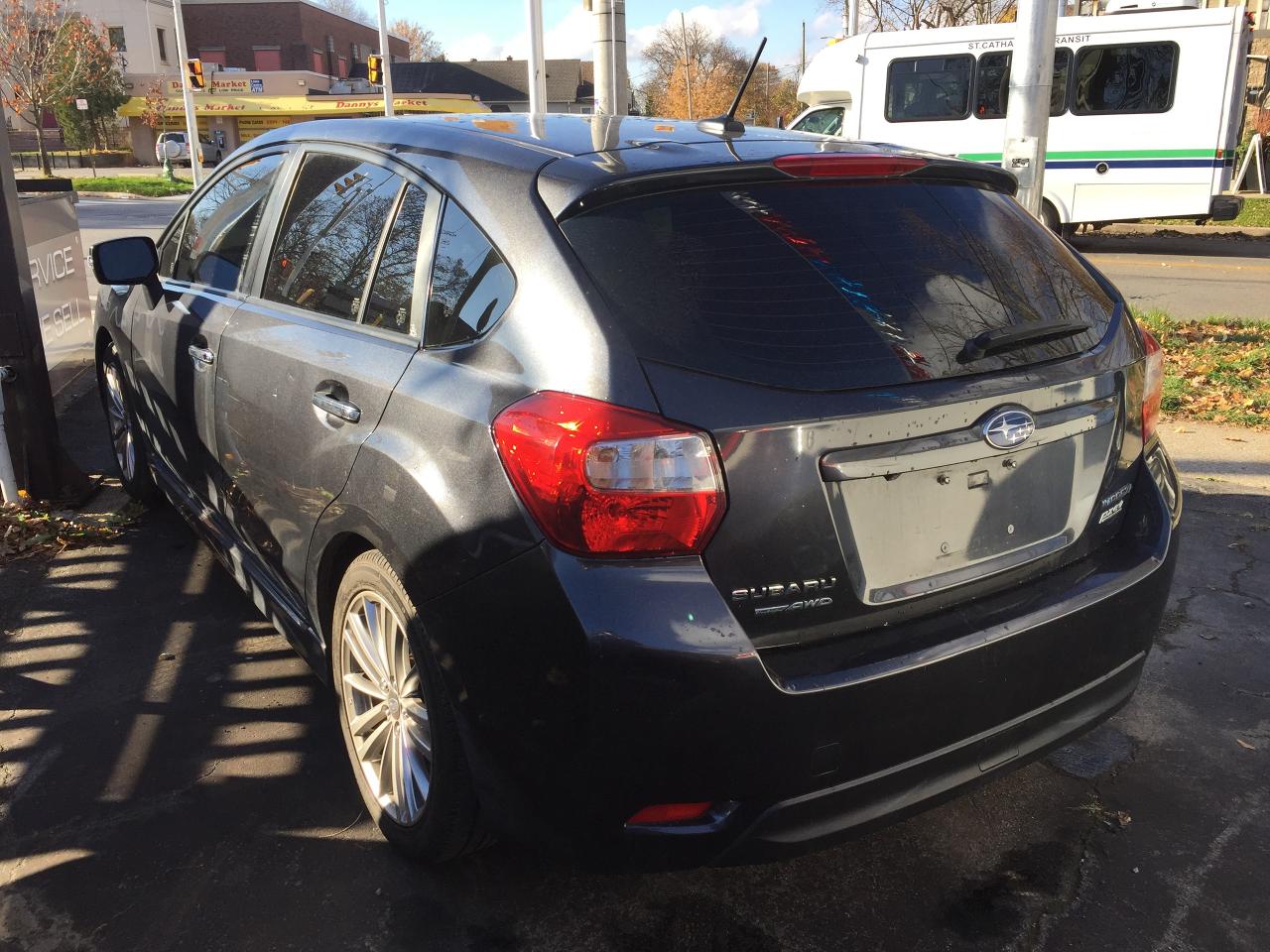 2016 Subaru Impreza 2.0i w/Limited & Tech Pkg (Nav & R.Cam) Photo