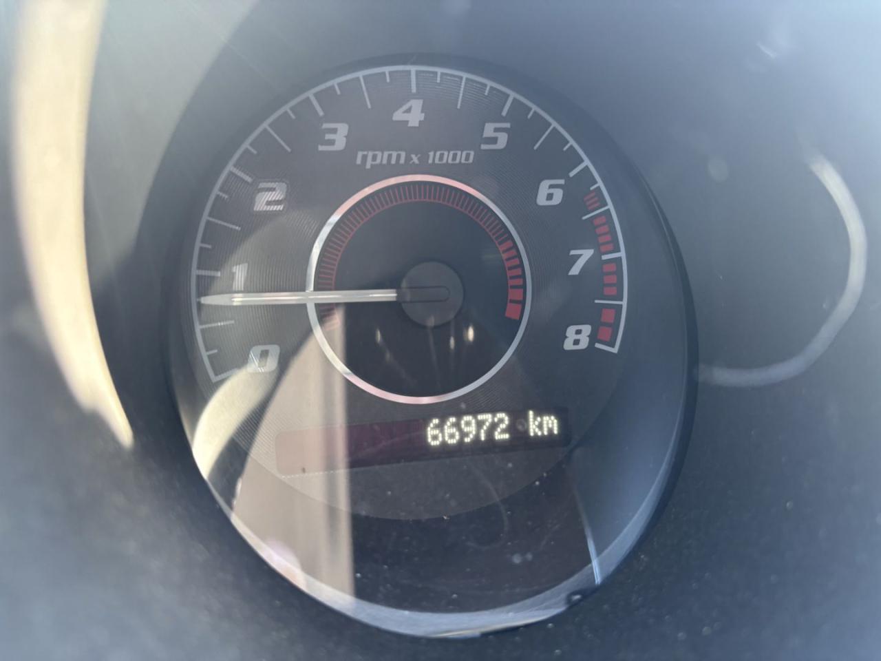 12529765