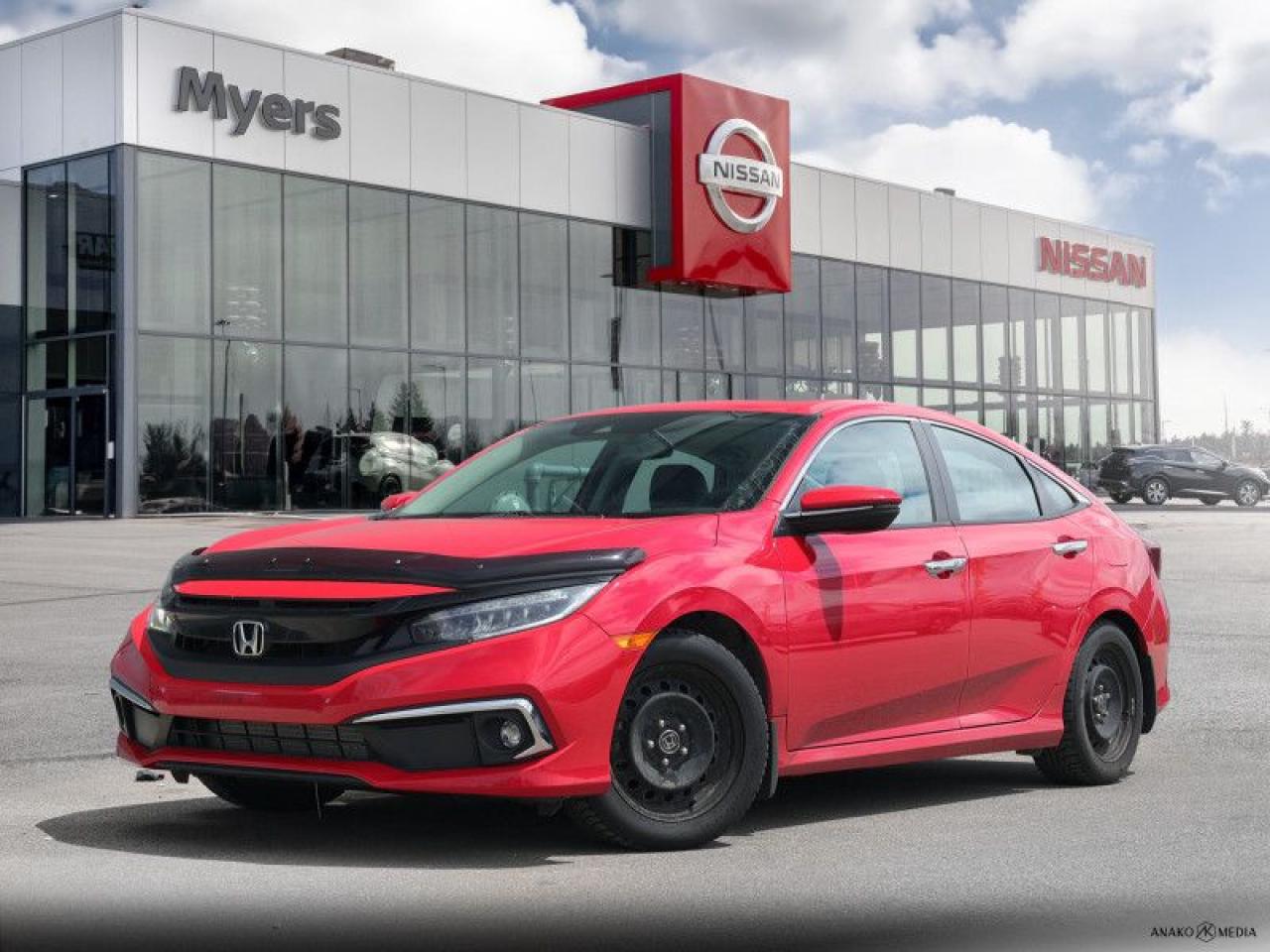 <b>Low Mileage, Leather Seats,  Navigation,  Sunroof,  Wireless Charging,  Premium Audio!</b><br> <br>  Compare at $30735 - KANATA NISSAN PRICE is just $28995! <br> <br>   The sporty design is perfectly complemented by its powerful, yet efficient engine, while its striking interior is designed with both comfort and safety in mind. This  2020 Honda Civic Sedan is fresh on our lot in Kanata. This low mileage  sedan has just 49,875 kms. Its  red in colour  . It has an automatic transmission and is powered by a  174HP 1.5L 4 Cylinder Engine. <br> <br> Our Civic Sedans trim level is Touring. This Touring Civic is the top of luxury with leather trimmed seats, navigation, wireless charging, premium audio, SiriusXM, HR Radio, rain sensing wipers, LED lighting with fog lights, side mirror turn signals, auto dimming rearview mirror, and a HomeLink remote system. Other luxury features include power moonroof, collision mitigation with forward collision warning, lane keep assist with road departure mitigation, adaptive cruise control, blind spot display, heated front seats, remote start, Apple CarPlay, Android Auto, Bluetooth, Siri EyesFree, WiFi tethering, leather steering wheel with cruise and audio controls, multi-angle rearview camera, 7 inch driver information display, and automatic climate control. The exterior has some great style with a proximity key, aluminum trimmed sport pedals, fog lights, paddle shifters, aluminum wheels, independent suspension, heated power side mirrors, and LED taillamps. This vehicle has been upgraded with the following features: Leather Seats,  Navigation,  Sunroof,  Wireless Charging,  Premium Audio,  Heated Seats,  Apple Carplay. <br> <br/><br> Payments from <b>$466.36</b> monthly with $0 down for 84 months @ 8.99% APR O.A.C. ( Plus applicable taxes -  and licensing    ).  See dealer for details. <br> <br>*LIFETIME ENGINE TRANSMISSION WARRANTY NOT AVAILABLE ON VEHICLES WITH KMS EXCEEDING 140,000KM, VEHICLES 8 YEARS & OLDER, OR HIGHLINE BRAND VEHICLE(eg. BMW, INFINITI. CADILLAC, LEXUS...)<br> Come by and check out our fleet of 60+ used cars and trucks and 110+ new cars and trucks for sale in Kanata.  o~o