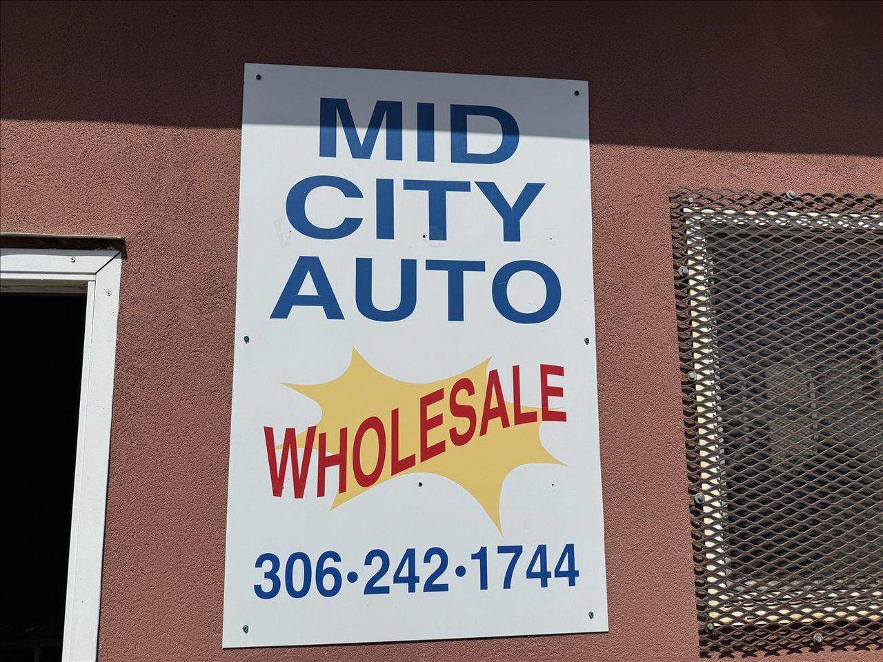 12533605