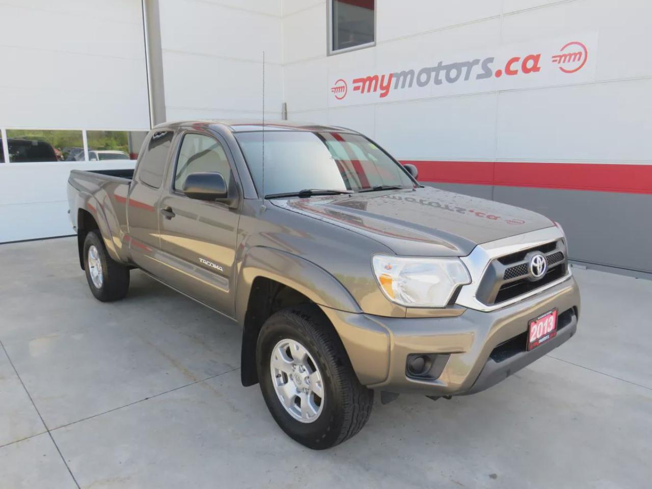 Used 2013 Toyota Tacoma Base 4.0L V6 (**RARE!!**LOW KM!!**MANUAL TRANSMISSION**SAFETY/CERTIFIED**ALLOY RIMS**A/C**TRAILER HITCH**REVERSE CAMERA**TRACTION CONTROL**POWER LOCKS**BLUETOOTH**DIGITAL TOUCHSCREEN**CD PLAYER**USB/AUX**) for sale in Tillsonburg, ON