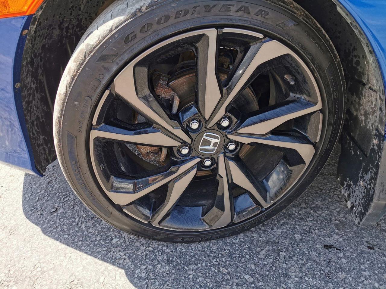 12537883