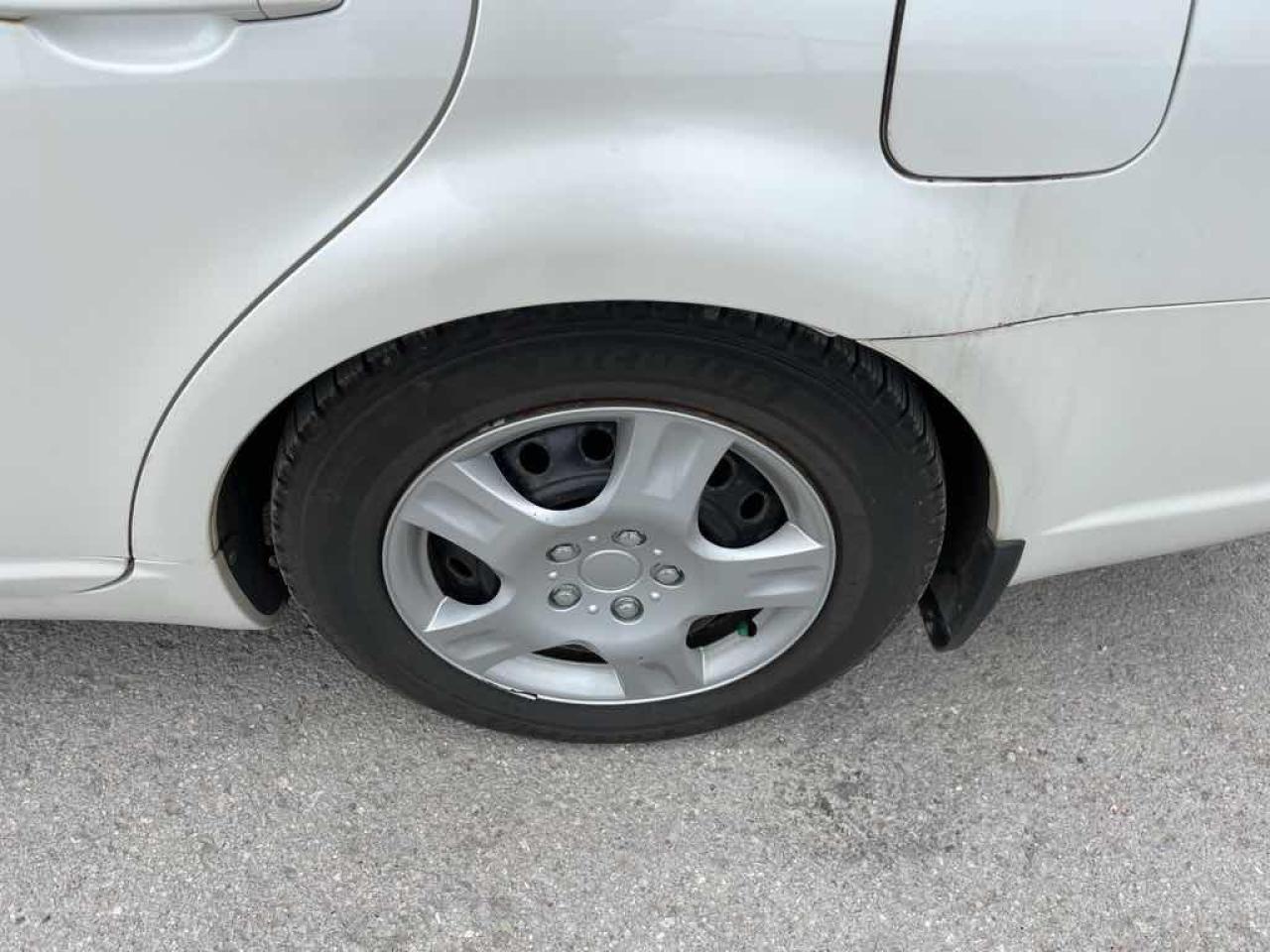 12547310