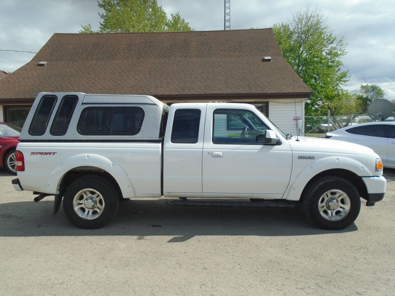 Carfax, safety, warranty, Only 2 Previous Owners!  Trades are welcome. Need financing? No problem, we deal with many financial companies that can help buyers finance the vehicle they want! Any credit welcome. 

Japanese Sport Car has been serving to Canadians for over 25 years, and we like to provide the best service possible to customers all over Canada! Buy Ahead And Pickup From Our Location Or Have It Shipped Directly To Your Door! Ask Us Today! BUY WITH CONFIDENCE! OMVIC & UCDA Registered dealer, Specializing in Commercial Trucks for over 25 years!!


Body Style
2WD SUPERCAB 126"
2 Doors
4.0L 6CYL GASOLINE FUEL
Automatic Transmission
Rear Wheel Drive
Exterior Color
white
Interior Color
grey

Equipment
5 PASSENGER
OWNERS MANUAL
AIR CONDITIONING
POWER LOCKS
ALLOY WHEELS
POWER STEERING
KEYLESS ENTRY
POWER WINDOWS
KEYLESS GO

We offer a comprehensive Client Care Package for only $799 which includes a certified safety inspection and a 2-year Silver Powertrain Warranty with UNLIMITED kilometers giving you confidence and coverage from day one. All prices do not include certification, applicable taxes (HST) and licensing fees. Without certification, as per OMVIC regulations, the vehicle is not road worthy, not E-tested, nor certified.