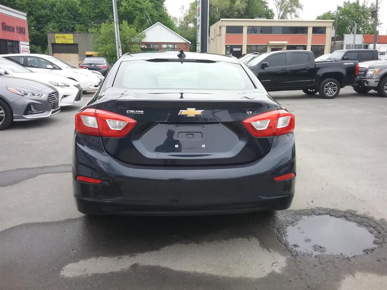 12550700