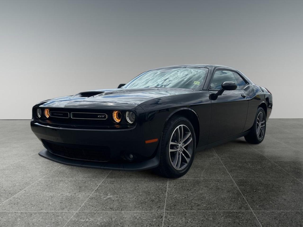 <b>Low Mileage, Rear View Camera,  Android Auto,  Apple CarPlay,  Uconnect,  Aluminum Wheels!</b><br> <br> We sell high quality used cars, trucks, vans, and SUVs in Saskatoon, Regina, Prince Albert and overall Saskatchewan area.<br> <br>   If you want a fast, powerful car that still manages to be practically sized and comfortably appointed, then look no further than the Dodge Challenger. This  2019 Dodge Challenger is for sale today. <br> <br>The Dodge Challenger is really entering its golden age. With all the heritage of being one of the last pony cars in the 60s and 70s, and all the technology that the new iteration uses, the Dodge Challenger is certainly going to remembered as a classic muscle car in the future. Own a piece of history in this powerful, practical, and iconic Dodge Challenger. This low mileage  coupe has just 68,272 kms. Its  black in colour  . It has a 8 speed automatic transmission and is powered by a  305HP 3.6L V6 Cylinder Engine.  It may have some remaining factory warranty, please check with dealer for details. <br> <br> Our Challengers trim level is GT. This amazing Challenger GT was designed to get the most out of that awesome V6. Unique aluminum wheels, heavy duty engine cooling, performance suspension, Sport mode, Super Trak Pak, and a functional hood scoop deliver more performance and power than you may think. All the while, you stay comfy and safe with interior accents, leather wrapped performance steering wheel with cruise and audio control, in cluster display, auto dimming rear view mirror, dual zone automatic climate control, power driver seat, proximity key, remote start, brake assistance, rear parking assistance sensors, and a rear view camera. Stay connected with the Uconnect 4 infotainment system with a touchscreen, Apple CarPlay, Android Auto, Bluetooth, 2 USBs, aux jack. On the exterior, you get LED taillamps, power heated mirrors, dual exhaust tips, automatic headlamps with halo LED accents, and fog lamps.<br> To view the original window sticker for this vehicle view this <a href=http://www.chrysler.com/hostd/windowsticker/getWindowStickerPdf.do?vin=2C3CDZKG3KH756084 target=_blank>http://www.chrysler.com/hostd/windowsticker/getWindowStickerPdf.do?vin=2C3CDZKG3KH756084</a>. <br/><br> <br/><br><h3 style=margin-top: -20px;>More about the Dealership:</h3><br>

Looking for a <i>used car dealership in Saskatchewan</i> you can truly count on? With over <b>50 years in the auto industry</b>, weve earned a solid reputation built on trust, quality service, and lasting customer relationships.<br><br>

Our team is here to guide you through every step of your car-buying journey - from car-buying expert advice to <b>flexible financing</b> through our <b>Credit Repair program</b>. With over 100 well-priced used vehicles in stock, we make it easy for you to drive home happy. We offer <b>Free Delivery</b> anywhere in Saskatchewan.<br><br>

As the trusted used car dealership in Saskatoon, Regina, Prince Albert; we are committed to an excellent customer experience. <br><br> o~o