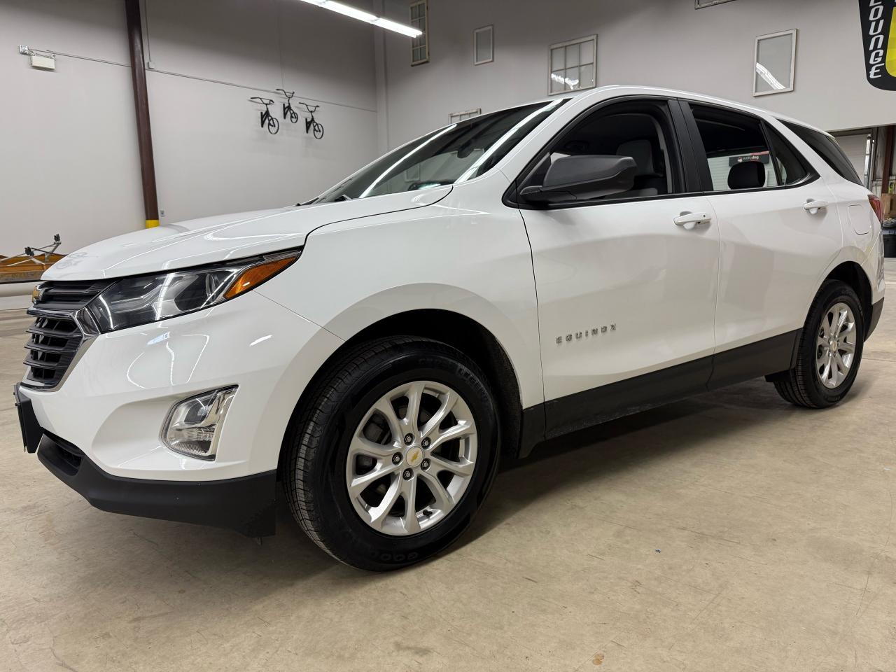 <p>Check out this sleek, pre-owned 2020 Chevrolet Equinox LS at LuckyDog Motors! This versatile SUV is ready for all your adventures, boasting a clean white exterior and a comfortable black interior. With only 96,354 km on the odometer, this Equinox has plenty of life left and is eager to hit the road with you. Its dependable 1.5L I4 engine, paired with an automatic transmission and All Wheel Drive, offers a smooth and confident driving experience in various road conditions. This four-door SUV / Crossover is the perfect blend of practicality and style.</p><p>Here are five features that make this Equinox stand out:</p><ol><li><strong>All-Wheel Drive Confidence:</strong> Conquer any Canadian weather condition with the sure-footedness of All-Wheel Drive, providing enhanced traction and control on every journey.</li><li><strong>Fuel-Efficient Performance:</strong> The economical 1.5L I4 engine delivers a fantastic balance of power and fuel efficiency, saving you money at the pump.</li><li><strong>Spacious & Versatile Interior:</strong> Enjoy the comfort of a well-appointed interior and ample cargo space, perfect for families, road trips, or hauling your gear.</li><li><strong>Automatic Transmission Ease:</strong> The automatic transmission ensures a seamless and effortless driving experience, making every commute or weekend getaway a breeze.</li><li><strong>Reliable Chevrolet Legacy:</strong> Benefit from Chevrolets reputation for dependability and quality, ensuring years of reliable performance and peace of mind.</li></ol><p>All Vehicles are Sold Certified and come with a 3 month/3,000 km 1-Star Powertrain Drive Global Warranty (extended warranties and coverages available). </p><p>At LuckyDog we believe in transparency, thats why all our vehicles come with a complete CarFax Vehicle report to ensure your not buying a salvaged or rebuilt vehicle. </p><p>* While every reasonable effort is made to ensure the accuracy of this information, some vehicle information may not be exactly as shown. </p>
