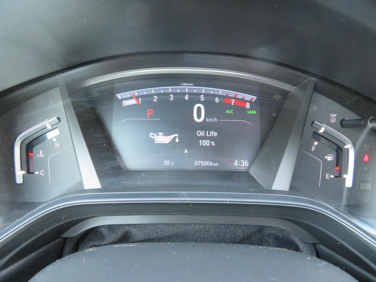 12557990