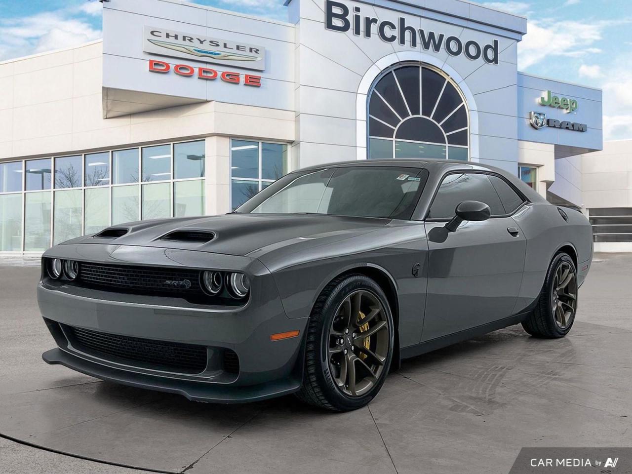 Accident Free!
Unleash the power of the 2023 Dodge Challenger SRT Hellcat Jailbreak! This low-mileage beast combines raw performance with luxurious comfort, offering an unparalleled driving experience for muscle car enthusiasts.

Key Features:
- Powerful 6.2L 8-cylinder engine
- Automatic transmission with RWD for optimal control
- Stunning Destroyer Grey exterior with sleek Black interior
- Accident-free history for peace of mind
- Adaptive suspension for a smooth, customizable ride
- Harman Kardon Audio Group for premium sound
- Alcantara seats and steering wheel for ultimate comfort
- Unique Brass Monkey SRT exterior badges and wheels

Dont miss your chance to own this exceptional Challenger. Visit Birchwood Chrysler Dodge Jeep Ram today to schedule a test drive and experience the thrill firsthand. Our team is ready to answer any questions and guide you through the purchasing process. Reserve your Hellcat Jailbreak now and prepare for an adrenaline-fueled adventure on the open road!
With us, Experience is Everything. Complete as much or as little of your purchase online as you like. All pricing is what you see is what you pay. No hidden fees. On our website you can choose payment options and terms knowing these are transparent and accurate.

Start your purchase online to build your exact pricing to your specifics like how much money down, vehicle trade and any accessories or added optional protection that suits your needs.

Any questions let us know by calling (204) 774-4444, wed love to send you a video to clarify any questions about a vehicle!

Visit us in store at 90-3965 Portage Ave in the Pointe West Autopark.

Dealer permit #5686
Dealer permit #5686