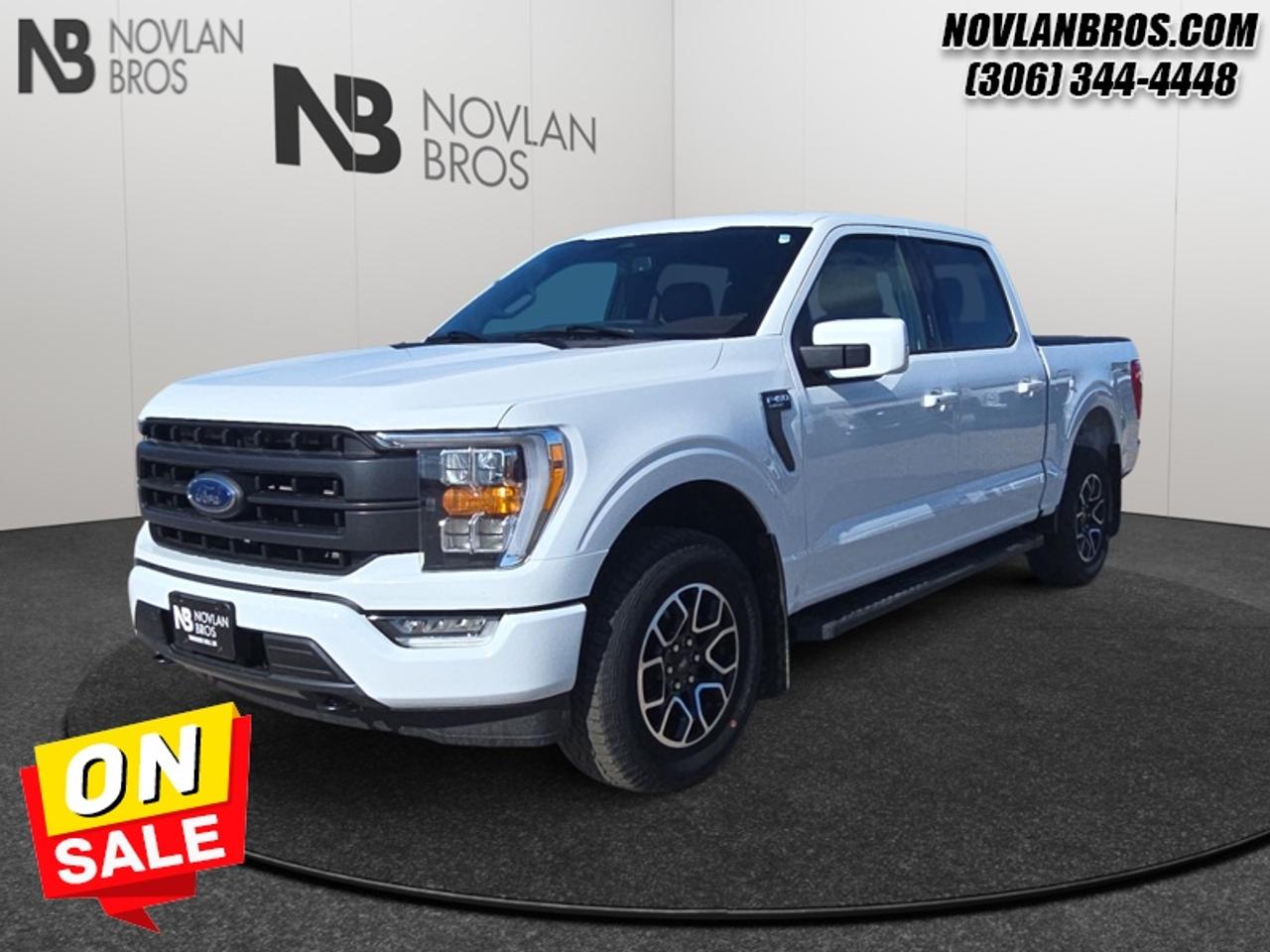 <b>Navigation, Heated Seats, Alloy Wheels, Leather Interior, Remote Engine Start!</b><br> <br> Check out our great inventory of pre-owned vehicles at Novlan Brothers!<br> <br> Hot Deal! Weve marked this unit down $7000 from its regular price of $61800.The Ford F-150 is for those who think a day off is just an opportunity to get more done. This 2023 Ford F-150 is for sale today in Paradise Hill.<br> <br>The perfect truck for work or play, this versatile Ford F-150 gives you the power you need, the features you want, and the style you crave! With high-strength, military-grade aluminum construction, this F-150 cuts the weight without sacrificing toughness. The interior design is first class, with simple to read text, easy to push buttons and plenty of outward visibility. With productivity at the forefront of design, the F-150 makes use of every single component was built to get the job done right!<br> <br>This Crew Cab 4X4 pickup has 57,512 km. Its White in colour and is completely accident free based on the <a href=https://vhr.carfax.ca/?id=jdW7bT5smr9Se9LM6TUVfHPbUlJIpGP8 target=_blank>CARFAX Report</a>. It has a 10 Speed Automatic transmission and is powered by a 325HP 2.7L V6 Cylinder Engine. <br> <br> Our F-150s trim level is Lariat. This luxurious Ford F-150 Lariat comes loaded with premium features such as leather heated and cooled seats, body colored exterior accents, a proximity key with push button start and smart device remote start, pro trailer backup assist and Ford Co-Pilot360 that features lane keep assist, blind spot detection, pre-collision assist with automatic emergency braking and rear parking sensors. Enhanced features also includes unique aluminum wheels, SYNC 4 with enhanced voice recognition featuring connected navigation, Apple CarPlay and Android Auto, FordPass Connect 4G LTE, power adjustable pedals, a powerful Bang & Olufsen audio system with SiriusXM radio, cargo box lights, dual zone climate control and a handy rear view camera to help when backing out of tight spaces. This vehicle has been upgraded with the following features: Navigation, Heated Seats, Alloy Wheels, Leather Interior, Remote Engine Start, Rear View Camera, AM/FM Audio System.<br> To view the original window sticker for this vehicle view this <a href=http://www.windowsticker.forddirect.com/windowsticker.pdf?vin=1FTEW1EP3PKF19977 target=_blank>http://www.windowsticker.forddirect.com/windowsticker.pdf?vin=1FTEW1EP3PKF19977</a>. <br/><br> <br>To apply right now for financing use this link: <a href=http://novlanbros.com/credit/ target=_blank>http://novlanbros.com/credit/</a><br> <br/><br>The Novlan family is owned and operated by a third generation and committed to the values inherent from our humble beginnings.<br> Come by and check out our fleet of 20+ used cars and trucks and 100+ new cars and trucks for sale in Paradise Hill.  o~o