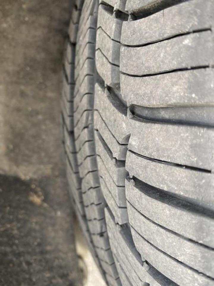 12560495