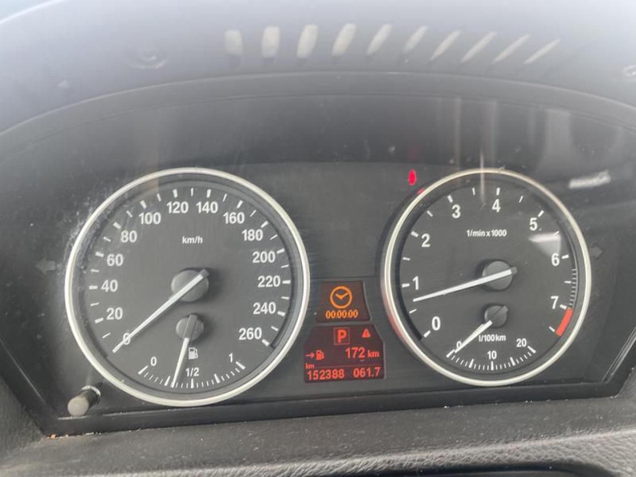 12560501