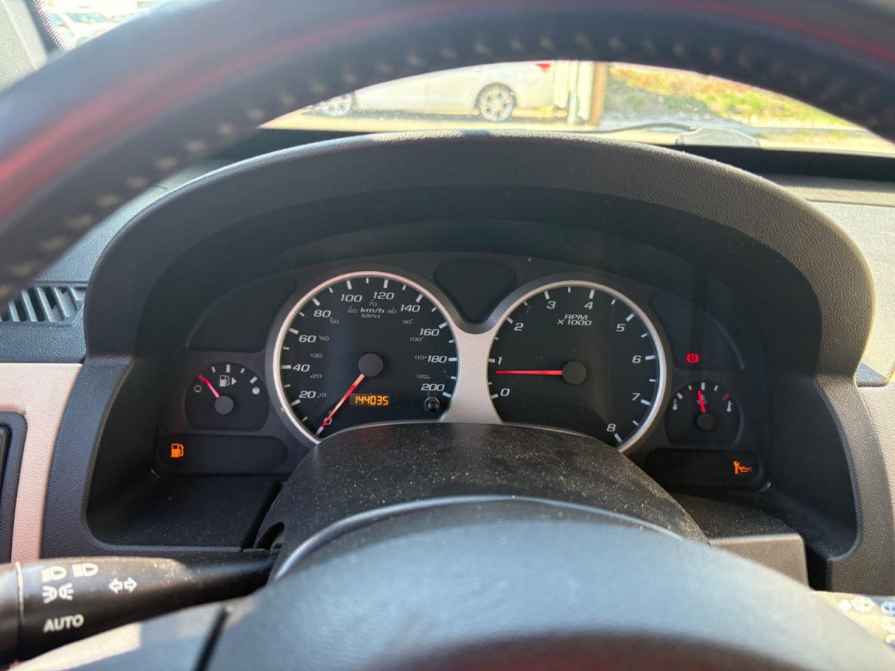 12561155