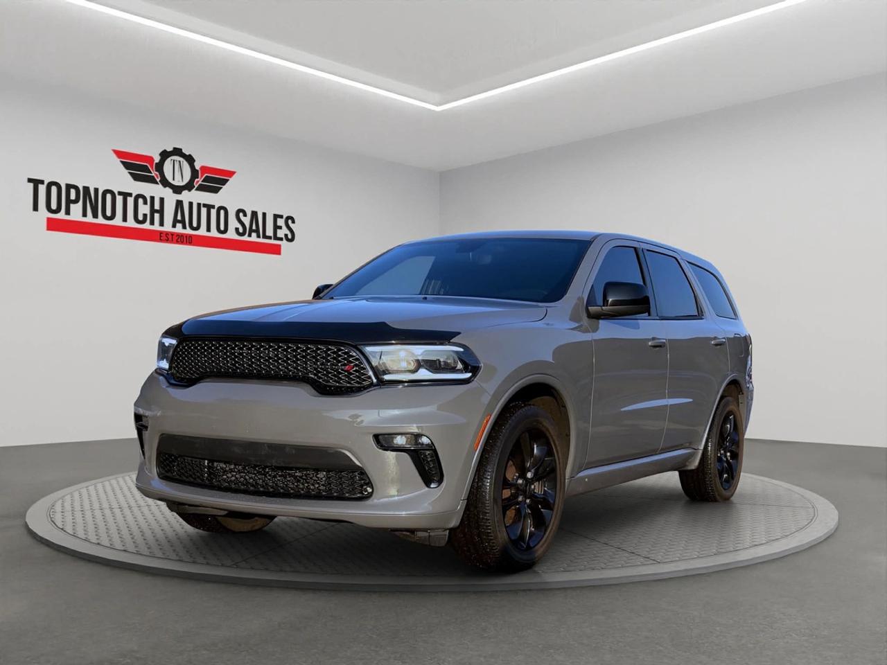 <h2><strong>2022 Dodge Durango<span id=jodit-selection_marker_1782227338276_7648033515855391 data-jodit-selection_marker=start style=line-height: 0; display: none;></span></strong></h2><p><strong>Now Available at Topnotch Auto Sales Inc</strong></p><p>Discover bold performance, rugged capability, and refined comfort with the <strong>2022 Dodge Durango</strong>. This versatile SUV blends muscle-car attitude with family-friendly practicality, offering strong performance, advanced technology, and a commanding presence on the road. Whether youre navigating city streets or heading out on a road trip, the Durango delivers confidence and capability every mile.</p><p><br></p><h2><strong>Performance & Capability</strong></h2><p>The 2022 Durango is engineered for power and control, offering a robust engine paired with a smooth automatic transmission. Designed to handle a variety of driving conditions, it delivers:</p><ul><li>Strong acceleration and dependable performance</li><li>Available all-wheel drive capability for enhanced traction</li><li>Smooth-shifting transmission for responsive driving</li><li>Impressive towing capability for added versatility</li><li>Stable handling with a comfortable, composed ride</li></ul><p>Whether commuting daily or hauling gear, the Durango rises to the occasion.</p><p><br></p><h2><strong>Interior Comfort & Features</strong></h2><p>Step inside a spacious and refined cabin designed for both driver and passengers:</p><ul><li>Seating for up to seven passengers</li><li>Premium cloth or leather-trimmed seating (depending on trim)</li><li>Power-adjustable drivers seat for personalized comfort</li><li>Tri-zone automatic climate control for added convenience</li><li>Ample cargo space with flexible rear seating configurations</li><li>Power windows, locks, and mirrors</li></ul><p>Enjoy a balance of comfort, space, and practicality perfect for families and everyday driving.</p><p><br></p><h2><strong>Technology & Connectivity</strong></h2><p>Stay connected and entertained with intuitive technology features:</p><ul><li>Large touchscreen infotainment system</li><li>Apple CarPlay® and Android Auto compatibility</li><li>Bluetooth hands-free calling and audio streaming</li><li>USB ports for charging and connectivity</li><li>Steering wheel-mounted controls</li><li>Premium sound system (on select trims)</li></ul><p>Everything you need is easily accessible for a seamless driving experience.</p><p><br></p><h2><strong>Safety & Peace of Mind</strong></h2><p>Drive with confidence thanks to advanced safety features:</p><ul><li>Rearview camera for easier parking</li><li>Electronic stability control and traction control</li><li>Anti-lock braking system (ABS)</li><li>Advanced airbag system throughout the cabin</li><li>Available driver-assist features for added protection</li></ul><p>Built with safety in mind, the Durango helps protect what matters most.</p><p><br></p><h2><strong>Vehicle Condition</strong></h2><p>This <strong>2022 Dodge Durango</strong> is in excellent condition, clean inside and out. Carefully inspected and well-maintained, its ready for its next owner.</p><p><br></p><h2><strong>Why Choose Topnotch Auto Sales?</strong></h2><p>At Topnotch Auto Sales Inc, we are dedicated to providing high-quality vehicles and exceptional customer service. Our experienced team ensures a smooth, transparent, and stress-free buying process.</p><p><br></p><h2><strong>Flexible Financing Solutions</strong></h2><p>We offer financing options for all credit types:</p><ul><li>Bad credit / No credit / New credit</li><li>Same-day approvals available</li><li>Low down payment options</li></ul><p>Let us help you get approved and on the road today.</p><p><br></p><h2><strong>Certification Option</strong></h2><p>This vehicle can be certified for <strong>$799</strong>, ensuring it meets all Ontario safety standards for added peace of mind.</p><p><br></p><h2><strong>OMVIC Compliance</strong></h2><p>Uncertified vehicles are sold asis and must be certified to meet Ontario road safety requirements. Were happy to assist with the certification process.</p><p><br></p><p>With over 14 years of experience, Topnotch Auto Sales Inc is your trusted destination for quality pre-owned vehicles and outstanding service.</p><p><br></p><p> <strong>Visit Us At:</strong></p><p>5455 Steeles Ave W, North York, ON M9L 1S7</p><p> <strong>Call or Text:</strong></p><p>416-879-7113</p>