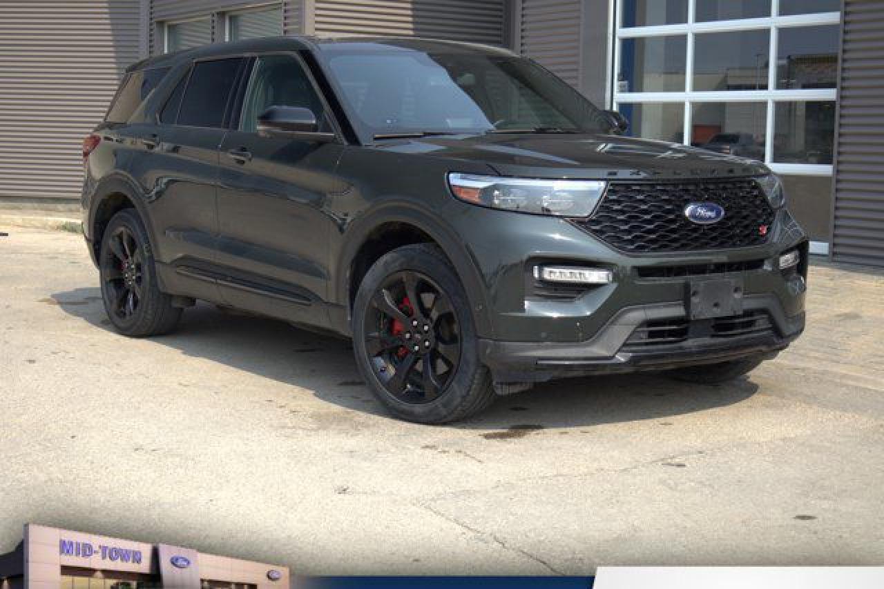 Recent Arrival!<br /><br />| One Owner, | Local Trade, | Clean Carfax, | Non Smoker, | Apple Carplay, | Android Auto, 4WD, 10.1 LCD Capacitive Portrait Touchscreen, 12 Speakers, 2 Additional Speakers, 3.58 Non-Limited Slip Rear Axle, 3rd row seats: bench, 4-Wheel Disc Brakes, ABS brakes, Active Cruise Control, Air Conditioning, AM/FM radio: SiriusXM, Auto High-beam Headlights, Auto-dimming door mirrors, Auto-dimming Rear-View mirror, Automatic temperature control, Black Carpet Floor Mats w/City Silver Stitching, Block heater, Brake assist, Bumpers: body-colour, Compass, Delay-off headlights, Driver door bin, Driver vanity mirror, Dual front impact airbags, Dual front side impact airbags, Electronic Stability Control, Emergency communication system: SYNC 3 911 Assist, Equipment Group 401A High Package, Exterior Parking Camera Rear, Four wheel independent suspension, Front & Rear Red Painted Perf Brake Calipers, Front anti-roll bar, Front Bucket Seats, Front dual zone A/C, Front fog lights, Front reading lights, Fully automatic headlights, Garage door transmitter, Heated door mirrors, Heated front seats, Heated rear seats, Heated steering wheel, Illuminated entry, Knee airbag, Leather Seating Surfaces Sport Captains Chairs, Leather steering wheel, Low tire pressure warning, Memory seat, Multicontour Seats w/Active Motion, Navigation System, Occupant sensing airbag, Outside temperature display, Overhead airbag, Overhead console, Panic alarm, Passenger door bin, Passenger vanity mirror, Performance Brakes, Power door mirrors, Power driver seat, Power Liftgate, Power passenger seat, Power steering, Power windows, Premium Technology Package, Radio data system, Radio: B&O Sound System by Bang & Olufsen, Rain sensing wipers, Rear air conditioning, Rear anti-roll bar, Rear reading lights, Rear window defroster, Rear window wiper, Remote keyless entry, Security system, Speed control, Speed-sensing steering, Speed-Sensitive Wipers, Split folding rear seat, Spoiler, Sport steering wheel, ST Street Pack, Steering wheel memory, Steering wheel mounted audio controls, SYNC 3 Communications & Entertainment System, SYNC 3/Apple CarPlay/Android Auto, Tachometer, Telescoping steering wheel, Tilt steering wheel, Traction control, Trip computer, Turn signal indicator mirrors, Twin Panel Moonroof, Variably intermittent wipers, Ventilated front seats, Wheels: 21 Aluminum.<br /><br />Forged Green Metallic 2022 Ford Explorer ST ONE OWNER LOCAL TRADE CLEAN CARFAX 4WD 3.0L EcoBoost V6 10-Speed Automatic<br /><br /><br />For further information please contact MidTown Ford sales department directly at 204-284-7650. Dealer #9695.<br /><br /><br />Reviews:<br />* On power, technology, and drivetrain smoothness, the Explorer tends to impress owners. The high-torque engine options and 10-speed automatic work seamlessly together, and the wide array of high-tech features are approachable and easy to use. The high-performing ST model is a pleasing drive with plenty of power and agility, making it a satisfying option, according to sportier drivers. Source: autoTRADER.ca