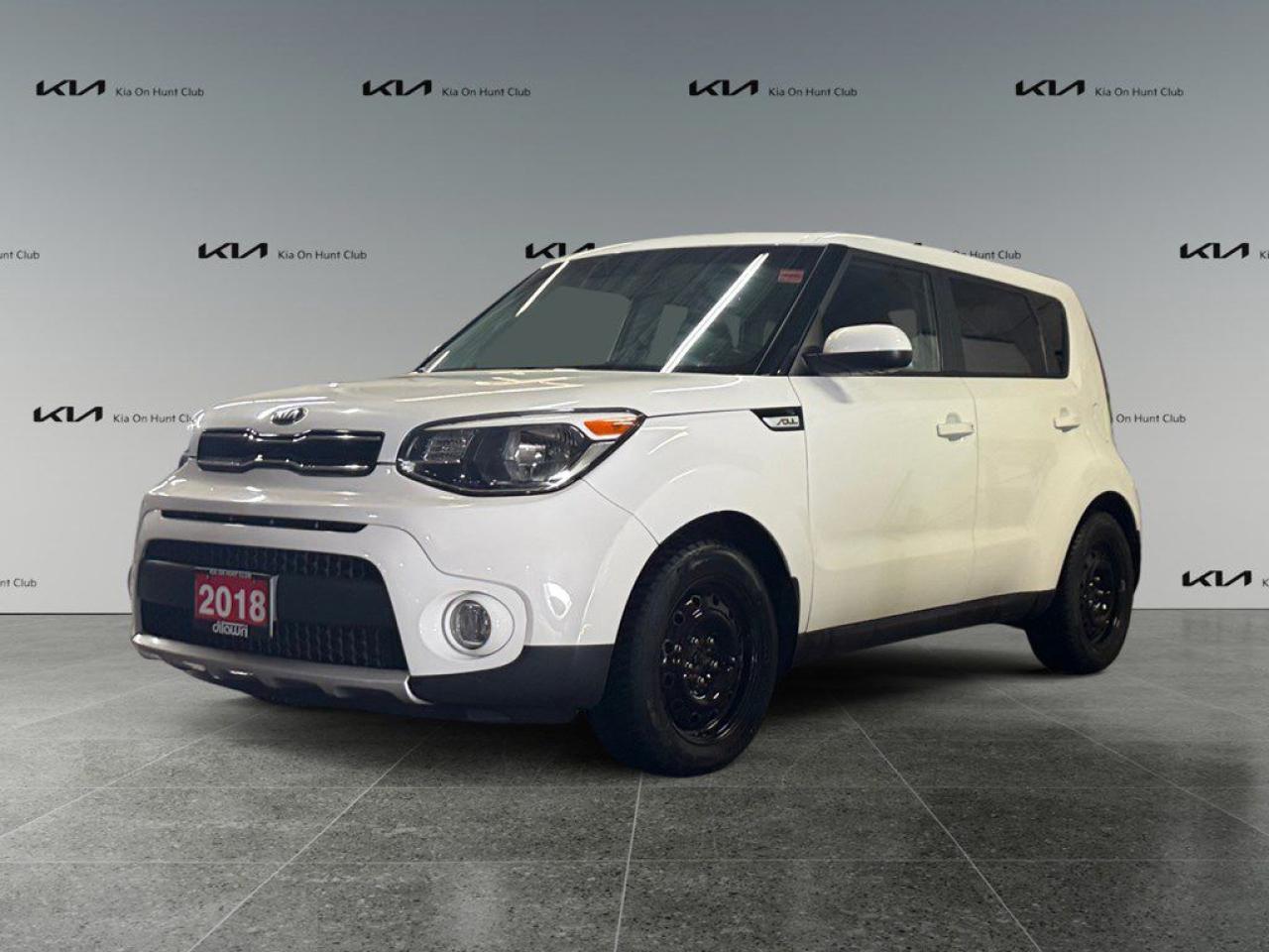Meet the 2018 Kia Soul EX Auto in a crisp white finish, featuring a front-wheel-drive system that promises agile handling for Canadian roads. This hatchback is powered by a responsive 2.0L 4-cylinder engine paired with an efficient automatic transmission, perfect for those who appreciate a balance of power and economy. The exterior boasts sleek lines complemented by stylish alloy wheels, adding a touch of sophistication to your daily drive. Inside, the Kia Soul offers a modern cabin with all the necessary comforts, including heated seats and power windows, making every journey an enjoyable experience. Keyless entry adds convenience to your busy lifestyle, while the ample hatch back space ensures practicality is never compromised. Stay connected and entertained with the built-in Bluetooth connection and satellite radio, all seamlessly integrated for ease of use. A backup camera enhances your driving confidence, and safety features such as brake assist provide added peace of mind. The inclusion of air conditioning ensures a pleasant cabin climate throughout the year. Perfect for urban explorers and families alike, the 2018 Kia Soul EX Auto is calling out to those who desire a reliable and stylish mode of transportation. Contact our dealership today to arrange a test drive and experience this remarkable vehicle firsthand.