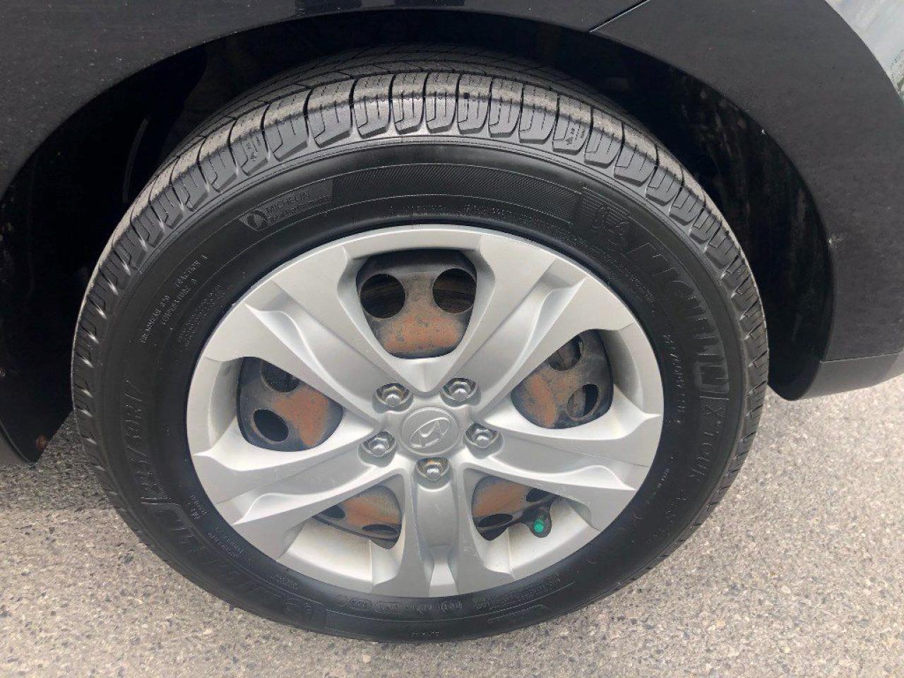12565019