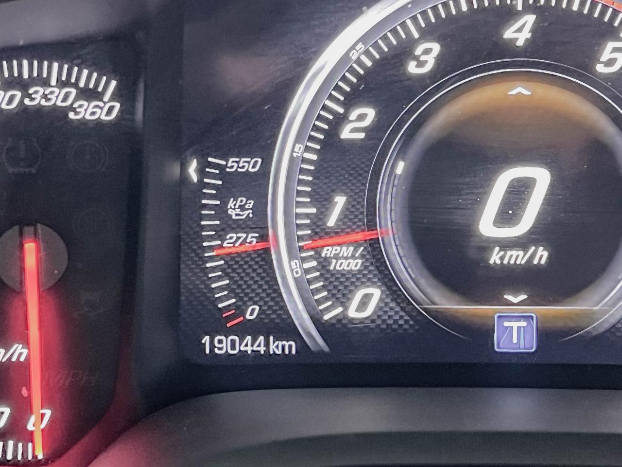12565208